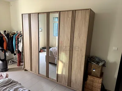 6-Door Mirror Wardrobe in Light Wood Finish — Good Condition