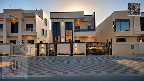 Villa for sale in Ajman, Al Zahia area. 5 master bedrooms, living room, majlis, and maid's room. Fr