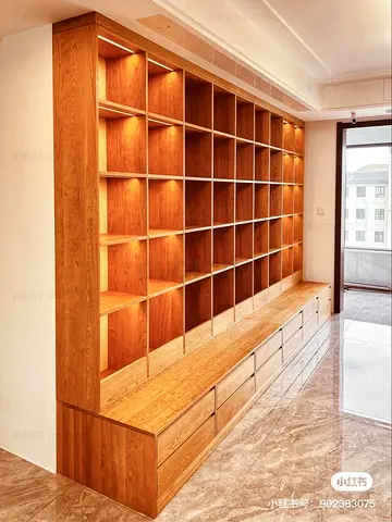 Custom Built-in Wooden Wall Bookcase with Lower Drawers