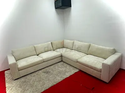 Beige color pottery barn corner sofa