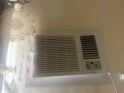 Window Air Conditioner - Functional, Clean, Wall-Mounted Unit