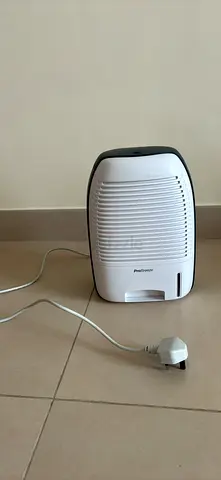 Portable dehumidifier - compact unit in good working condition