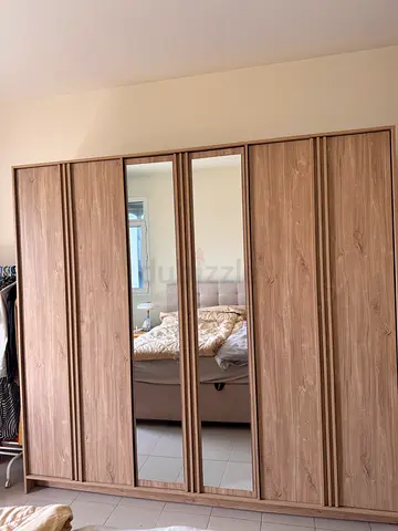 6-Door Mirror Wardrobe in Light Wood Finish — Good Condition