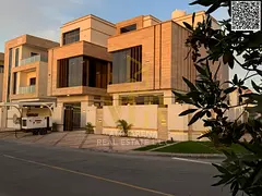 Luxury villa for sale in Al Yasmin, modern design with exceptional specifications, high-end finishes