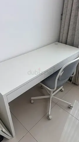 Simple white study desk with tow drawers and matching chair