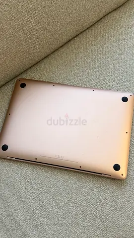 Used Rose Gold MacBook (Bottom View Shown) - Good Condition