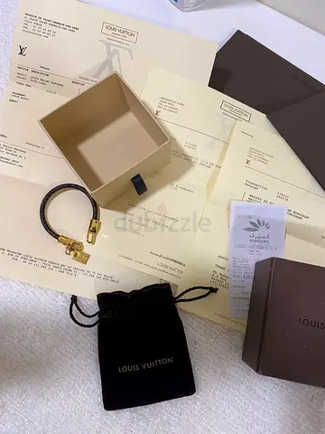 Louis Vuitton Petite Bracelet/Charm Strap with Box and Papers. Size 17