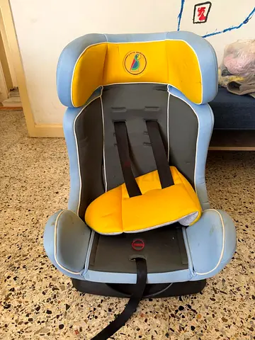 Used toddler car seat - convertible booster/car seat (blue  yellow)