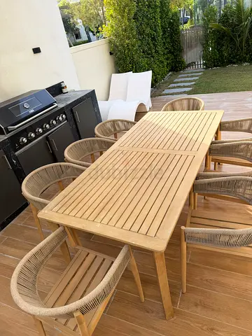 Outdoor Teak Dining Table with 8 Woven Rope Chairs - Good Condition