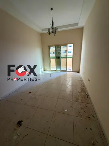 Cheap 1BHK for annual rent in Emirates City Ajman. Balcony open view, free parking. AED 26,000 only