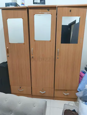 Three-door wooden wardrobe with mirrors - good condition