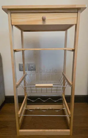 Compact wooden kitchen trolley with drawer and wine rack
