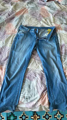 Light blue jeans, size likely M - gently used