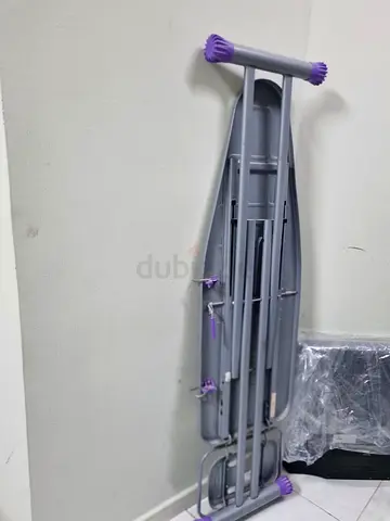 Bed and iron stand