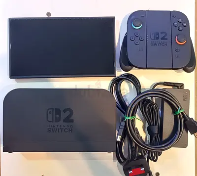 Nintendo Switch OLED (Neon) with dock, Joy-Con grip and cables - Good condition