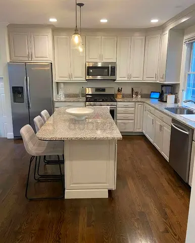 Modern White Kitchen with Granite Island with storage