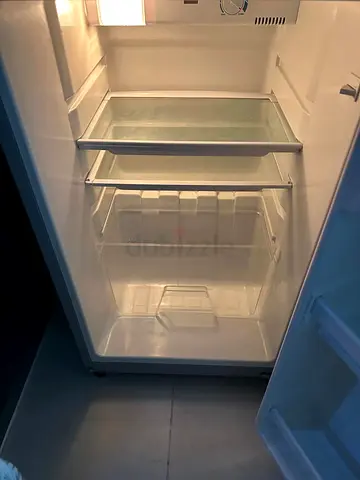 Small single-door refrigerator in good working condition