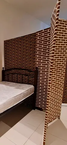 Four-panel folding room divider/screen with brick-patterned fabric