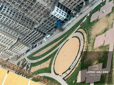 Two bedrooms and a living room, furnished with luxury furniture, with a maid's room and a balcony w