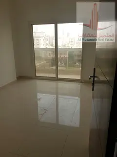 One bedroom and living room with balcony, excellent location, easy access to Dubai and Sharjah