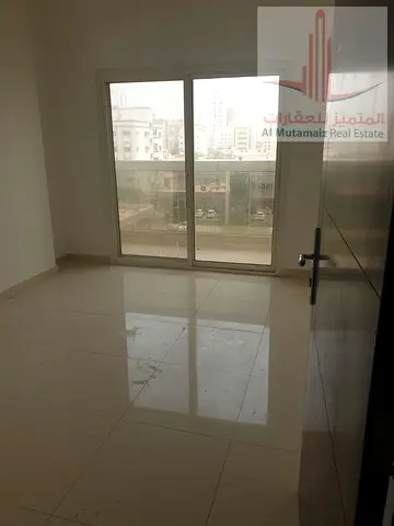 One bedroom and living room with balcony, excellent location, easy access to Dubai and Sharjah