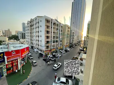 For rent in Al Karama 🌟 One-bedroom apartment with a living room, kitchen, bathroom, and balcony 📍 Excellent location opposite Al Madani Restaurant