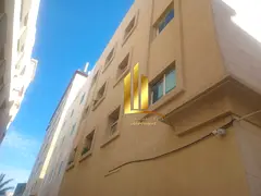 Building for sale in Muwailih commercial area, excellent location on Qar Street 36, owned by citizen