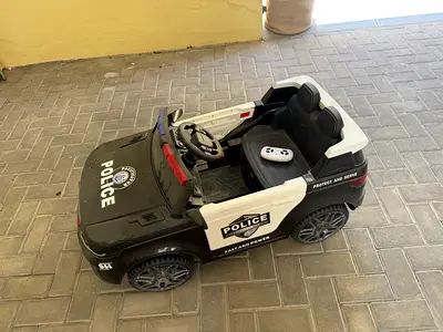 Kids Electric Ride-On Police Car with Remote - Good Condition