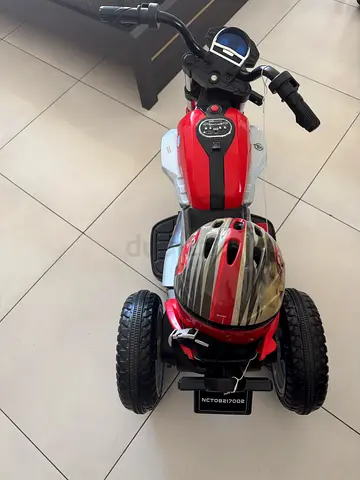 Sold as-is.ONLY FOR REPAIR OR PARTS. Kids Electric Ride-On Motorcycle with Helmet