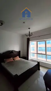 Two bedrooms and a living room in Al Qasba, fully furnished, for annual rent
