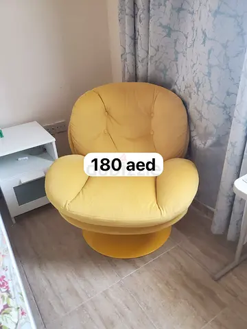 Comfortable Yellow Swivel Accent Chair - Good Condition