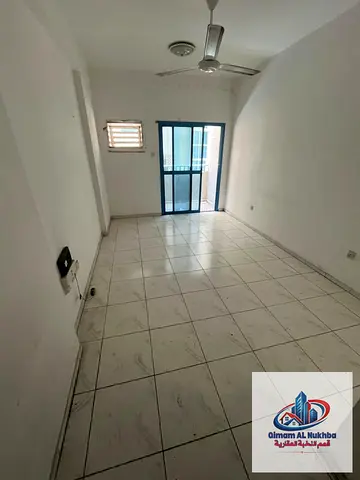 Cheapest two-bedroom apartment in Sharjah - Al Shuwaheen area - Balcony - Two bathrooms - Central gas - Prime strategic location with excellent servic