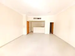 LAVISH BIG SIZE STUDIO ON ROAD BUILDING IN MUWAILEH