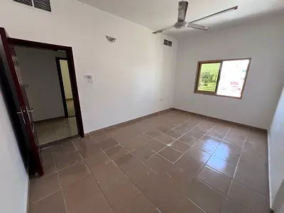 Two bedrooms and a living room - near the court and Ajman University - balcony - separate living ro