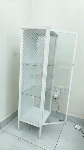 White cabinet with glass