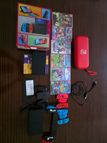 Nintendo Switch console bundle with 6 games, extra controllers and accessories