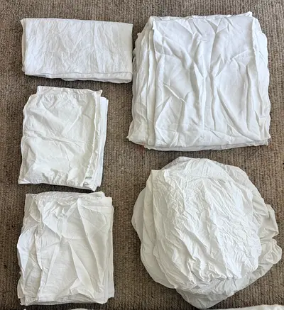 Set of white linen/cotton bedding from Ikea, The White Company, Soak and Sleep and HM - details