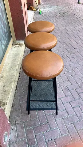 Excellent condition pottery Barn Brand Maison Leather Backless Swivel  3 Stool