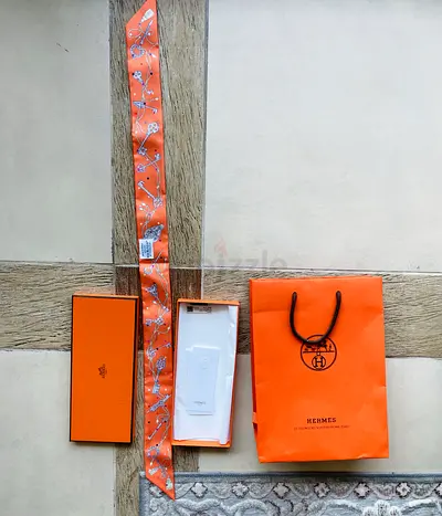 Hermès Orange Silk Twilly Scarf with Box  Bag. Retails 1006