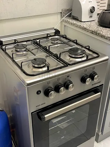 Stainless Steel 4-Burner Gas Cooker with Oven - Good Condition