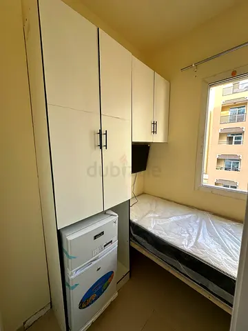 Available single partition with smart tv and fridge in warqaa 1  Full time cleaning