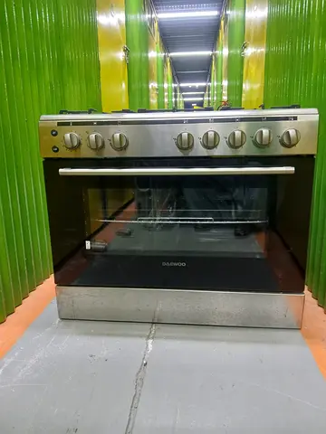 Daewoo Stainless Steel Gas Range with Oven - Good Working Condition..