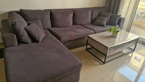 Large L-shaped Grey Fabric Sofa with Cushions In Very Good Condition