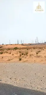 - Residential and commercial lands in the Emirate of Sharjah, prime location opposite Al Yasmeen on