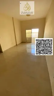 Two-bedroom apartment for rent in Al Jurf 3, Ajman, with two bathrooms, a balcony, and a very spaci