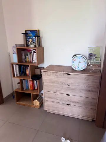 Light wood chest of drawers with matching bookshelf - good condition