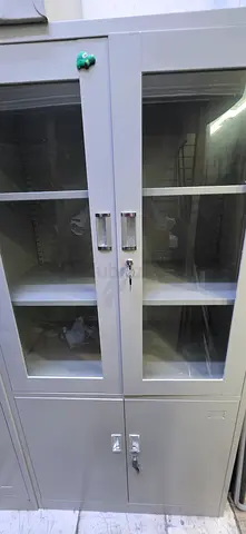 Metal storage cabinet with glass doors - sturdy office/garage cupboard