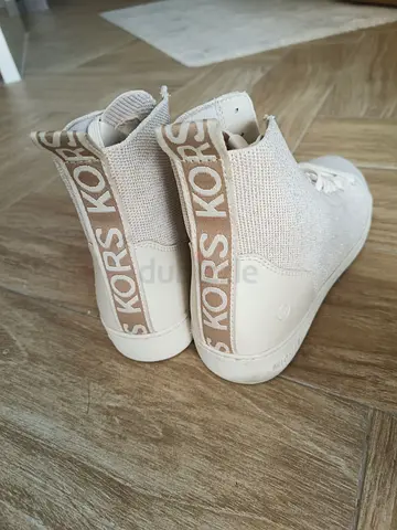 Michael Kors beige knit high-top sneakers, size not specified