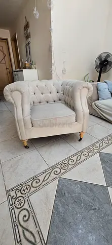 Cream tufted single armchair - good condition