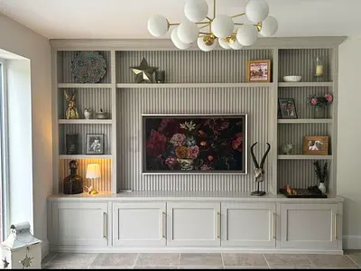 Custom Built-in Entertainment Unit with Shelving and Cabinets